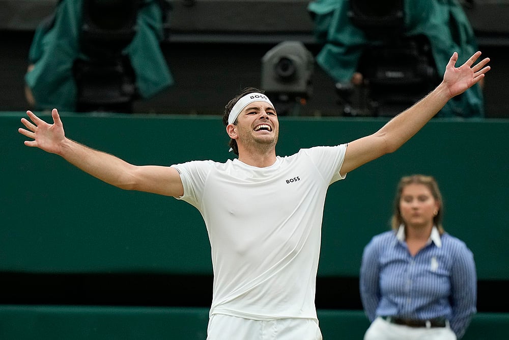 | Photo: AP/Mosaab Elshamy : Taylor Fritz celebrates after defeating Alexander Zverev